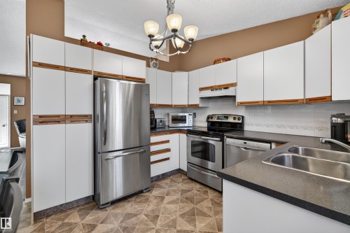 9347 175 Avenue, Edmonton, AB - Indoor Photo Showing Kitchen With Double Sink