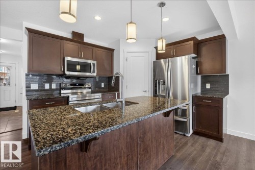 20315 43 Avenue, Edmonton, AB - Indoor Photo Showing Kitchen With Stainless Steel Kitchen With Double Sink With Upgraded Kitchen