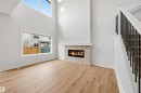 3048 Dixon Landing Landing, Edmonton, AB  - Indoor Photo Showing Living Room With Fireplace 