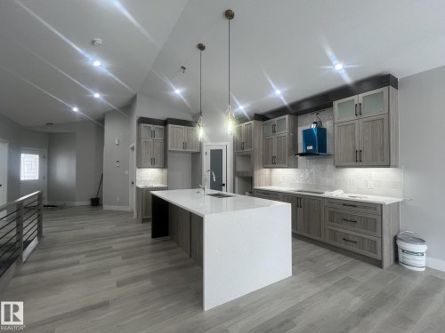 261 Meadowview Drive, Fort Saskatchewan, AB - Indoor Photo Showing Kitchen With Upgraded Kitchen