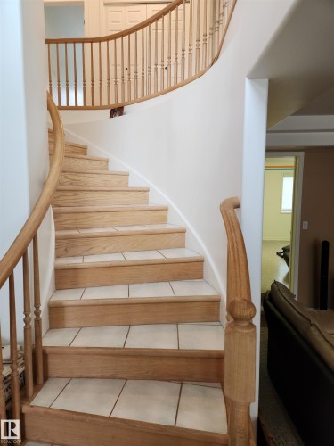 From the front entrance, showing the staircase to the upper level - 4317 53 Street, St. Paul Town, AB - Indoor Photo Showing Other Room