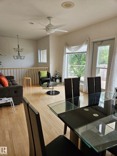 and the living room and upper front walk-out deck access - 4317 53 Street, St. Paul Town, AB - Indoor