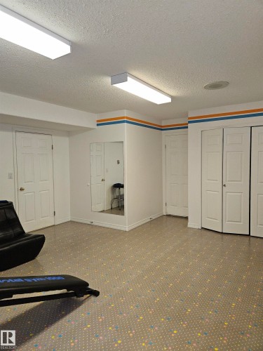 with room for additional recreation, a children's play area, or storage, an office, or additional space for your family's needs - 4317 53 Street, St. Paul Town, AB - Indoor