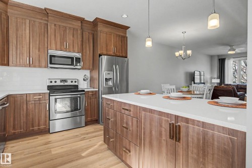 82 Gilmore Way, Spruce Grove, AB - Indoor Photo Showing Kitchen With Stainless Steel Kitchen With Upgraded Kitchen