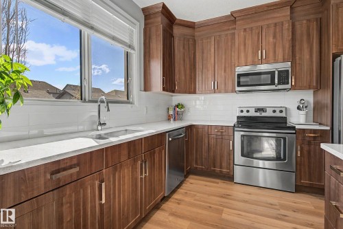 82 Gilmore Way, Spruce Grove, AB - Indoor Photo Showing Kitchen With Stainless Steel Kitchen With Double Sink