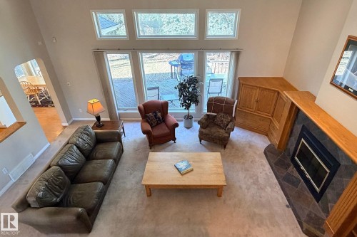 721 Butterworth Drive, Edmonton, AB - Indoor Photo Showing Living Room With Fireplace