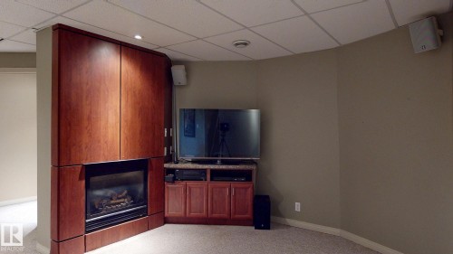 721 Butterworth Drive, Edmonton, AB - Indoor Photo Showing Other Room With Fireplace