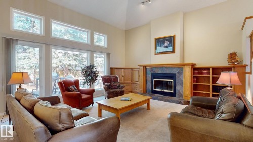 721 Butterworth Drive, Edmonton, AB - Indoor Photo Showing Living Room With Fireplace