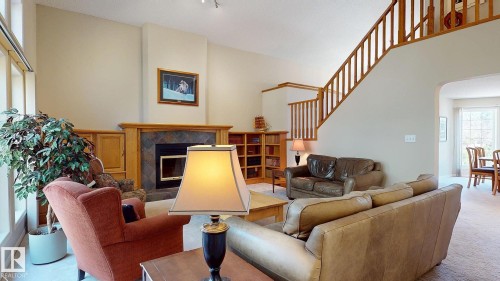 721 Butterworth Drive, Edmonton, AB - Indoor Photo Showing Living Room With Fireplace