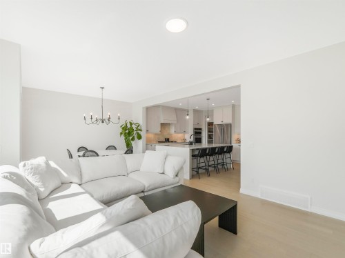 Open concept living space with light wood flooring and recessed lighting - 19 Nettle Crescent, St. Albert, AB - Indoor Photo Showing Living Room