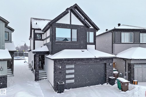 The property features a modern exterior with dark-toned siding and white trim accents - 19 Nettle Crescent, St. Albert, AB - Outdoor