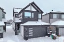 The property features a modern exterior with dark-toned siding and white trim accents - 19 Nettle Crescent, St. Albert, AB  - Outdoor 