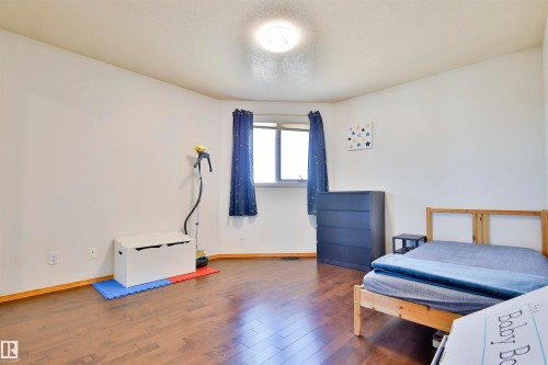 8710 156A Avenue, Edmonton, AB - Indoor Photo Showing Bedroom