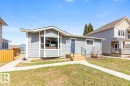 Light gray siding exterior with white trim accents - 4508 109A Avenue, Edmonton, AB  - Outdoor With Deck Patio Veranda 