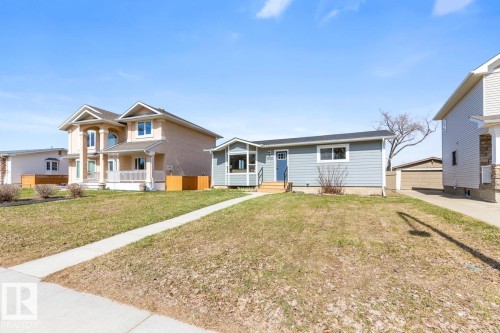 Single-story residence featuring blue siding and white trim - 4508 109A Avenue, Edmonton, AB - Outdoor With Facade