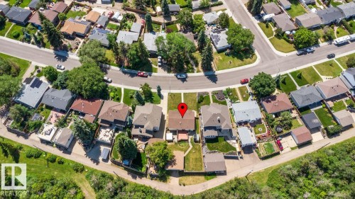 Aerial view of a residential property with a detached garage and a landscaped yard - 4508 109A Avenue, Edmonton, AB - Outdoor With View