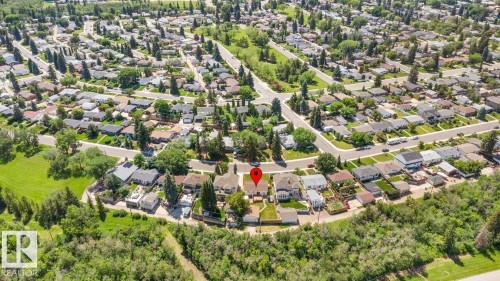Aerial perspective showcasing a residential neighborhood with numerous homes and streets - 4508 109A Avenue, Edmonton, AB - Outdoor With View