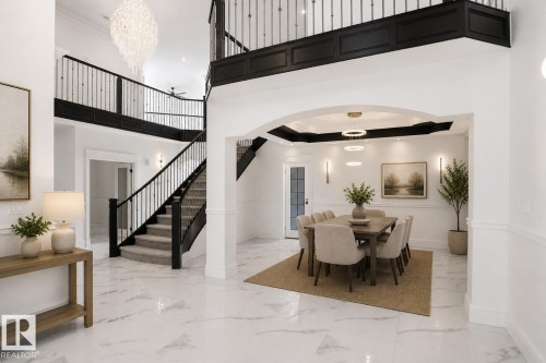 Grand foyer with marble-style flooring - 6823 18 Avenue, Edmonton, AB - Indoor