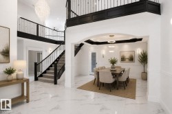 Grand foyer with marble-style flooring - 