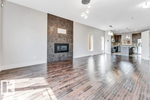 2604 20 Avenue, Edmonton, AB - Indoor Photo Showing Living Room With Fireplace