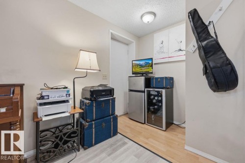 Light-toned walls with ceiling-mounted lighting - 7422 188 Street, Edmonton, AB - Indoor