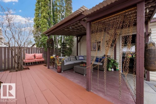 Expansive outdoor deck with a pergola-covered patio area - 7422 188 Street, Edmonton, AB - Outdoor