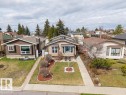Single-story residence featuring a neutral-toned exterior, a gabled roof, and a prominent bay window - 7422 188 Street, Edmonton, AB  - Outdoor 