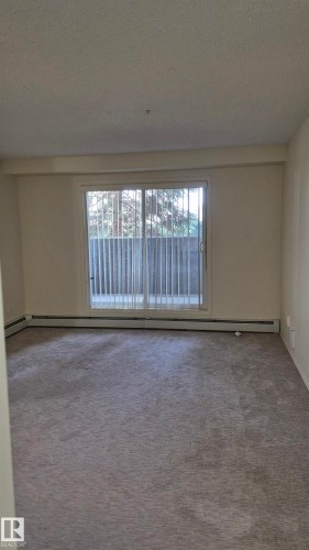 114 2430 Guardian Road, Edmonton, AB - Indoor Photo Showing Other Room