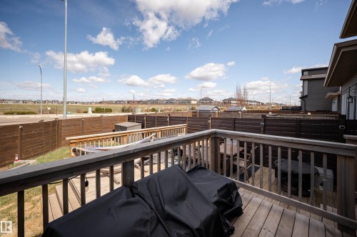 Wood-finish multi-level deck with a privacy fence - 2704 Koshal Place, Edmonton, AB - Outdoor With Deck Patio Veranda