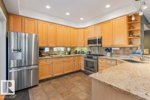 11030 122 Street, Edmonton, AB - Indoor Photo Showing Kitchen With Stainless Steel Kitchen