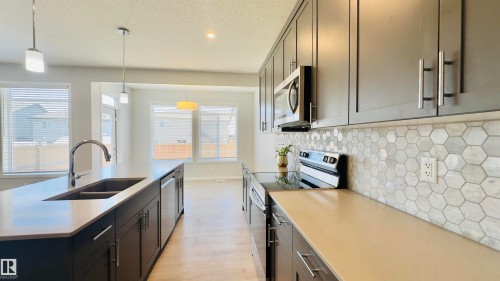 932 Mcconachie Blvd, Edmonton, AB - Indoor Photo Showing Kitchen With Double Sink With Upgraded Kitchen