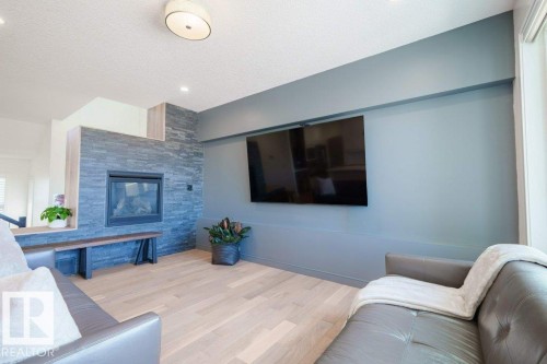 3386 Cutler Crescent, Edmonton, AB - Indoor Photo Showing Living Room With Fireplace
