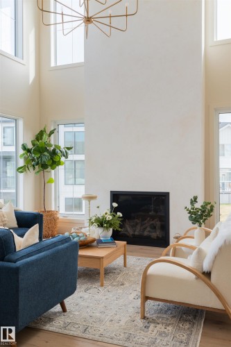 8 Jardin Place, St. Albert, AB - Indoor Photo Showing Living Room With Fireplace
