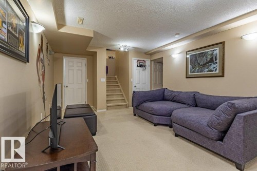 1676 Tomlinson Common, Edmonton, AB - Indoor Photo Showing Living Room