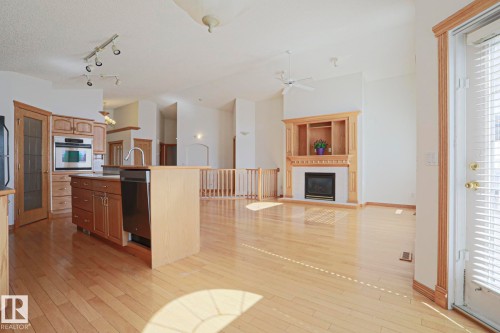 16203 89 Street, Edmonton, AB - Indoor Photo Showing Kitchen With Fireplace
