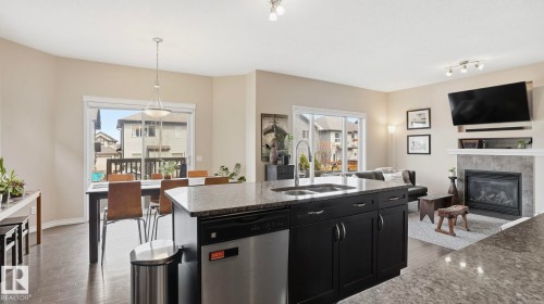 37 Codette Way, Sherwood Park, AB - Indoor Photo Showing Kitchen With Fireplace With Double Sink