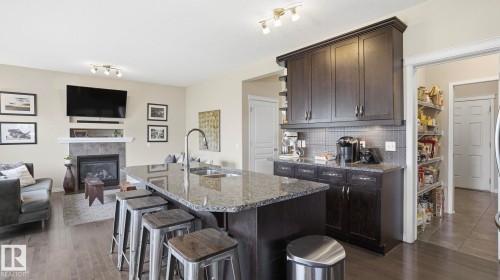 37 Codette Way, Sherwood Park, AB - Indoor Photo Showing Kitchen With Fireplace With Double Sink