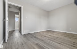 Light gray wood-finish flooring - 