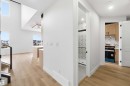 Bright interior showcasing wood-finish flooring throughout - 417 Pine Point(E), Leduc, AB  - Indoor 