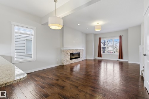 39 Greenbury Boulevard, Spruce Grove, AB - Indoor Photo Showing Living Room With Fireplace