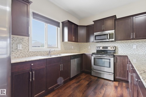 39 Greenbury Boulevard, Spruce Grove, AB - Indoor Photo Showing Kitchen With Upgraded Kitchen