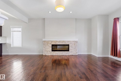 39 Greenbury Boulevard, Spruce Grove, AB - Indoor Photo Showing Living Room With Fireplace
