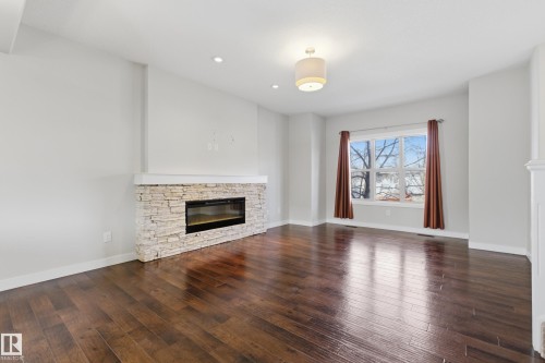 39 Greenbury Boulevard, Spruce Grove, AB - Indoor Photo Showing Living Room With Fireplace