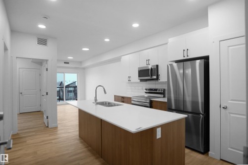 #101 3715 141 St Sw, Edmonton, AB - Indoor Photo Showing Kitchen With Stainless Steel Kitchen With Upgraded Kitchen
