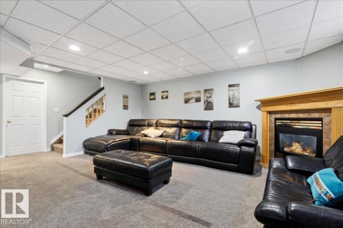 22 Harvest Bay, Stony Plain, AB - Indoor With Fireplace