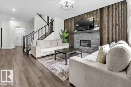 2107 14 Avenue, Edmonton, AB - Indoor Photo Showing Living Room With Fireplace
