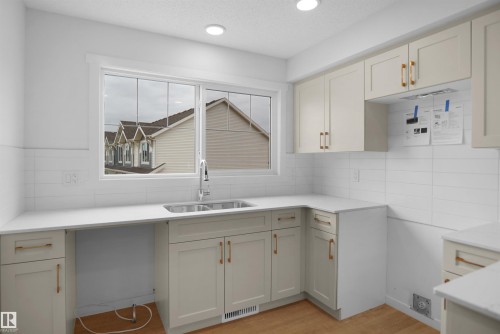 23 531 Merlin Landing, Edmonton, AB - Indoor Photo Showing Kitchen With Double Sink