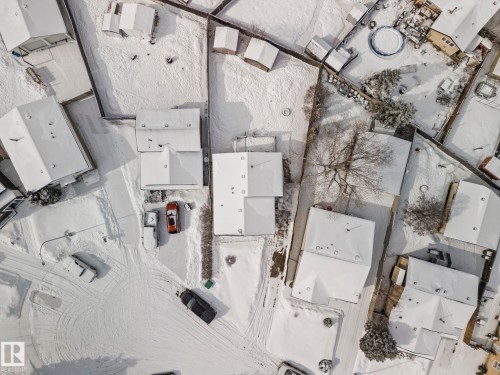 Aerial view of the property and surrounding neighborhood, featuring snow-covered rooftops and grounds - 115 Warwick Road, Edmonton, AB - Other