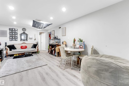 Living room with recessed lighting and wood finished floors - 12202 45 Street, Edmonton, AB - Indoor