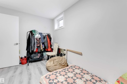 Bedroom featuring wood finished floors - 12202 45 Street, Edmonton, AB - Indoor Photo Showing Bedroom